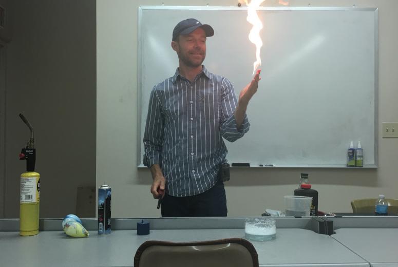 Instructor with fire demonstration